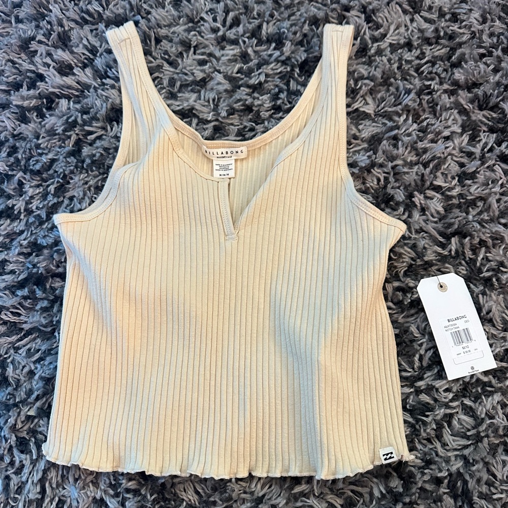 Light yellow billabong tank top. Brand new with tags. Size medium.